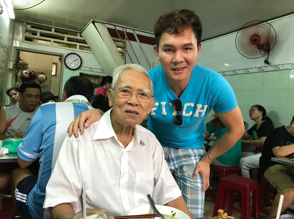 The maternal grandfather having Bun Bo Hue for breakfast