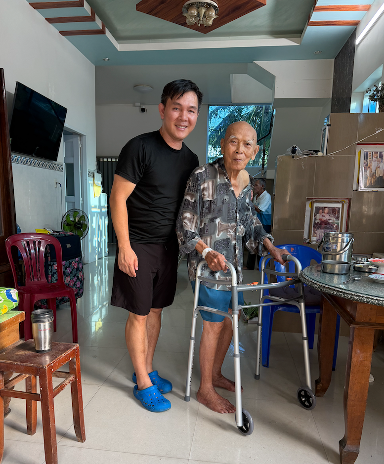 Taking a photo in My Tho with the maternal grandfather