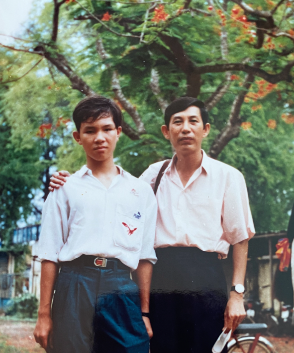 Taking photo with my Teacher in middle school