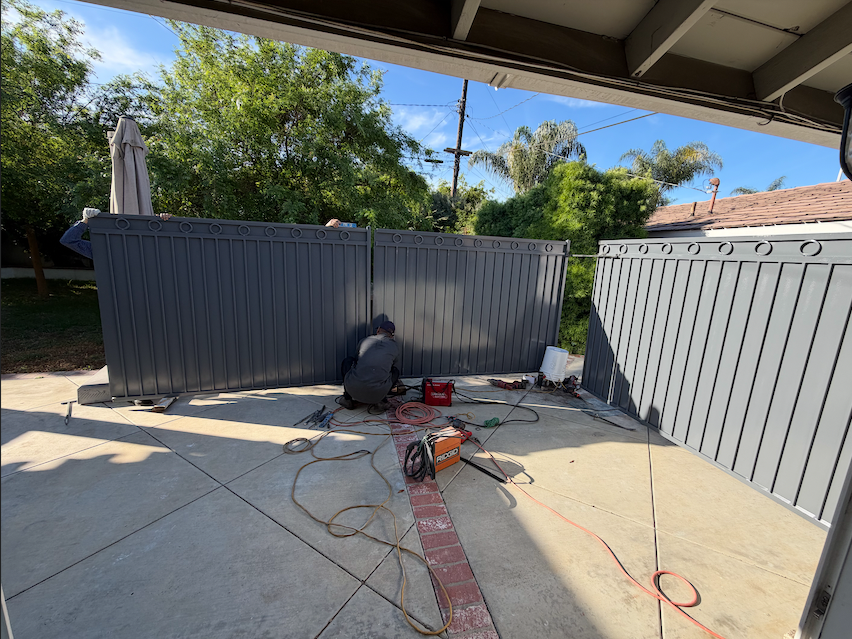 Workers Putting Up Fences